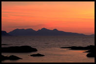 Sunset over the island of Rum - photographed from Arisaig